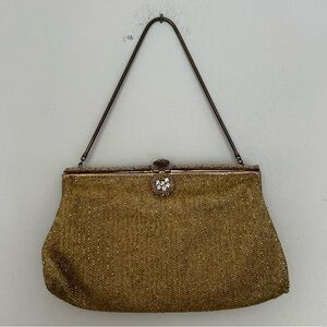 Vintage gold beaded evening clutch with a rhinestone clasp. Made in France.